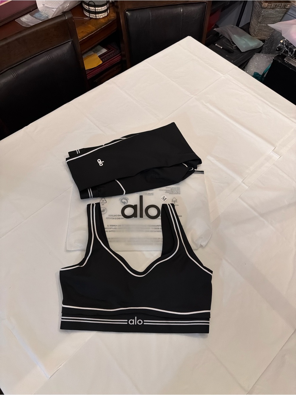 ALO Yoga Black & White V-Neck Sports Bra and leggings with Contrast Trim
